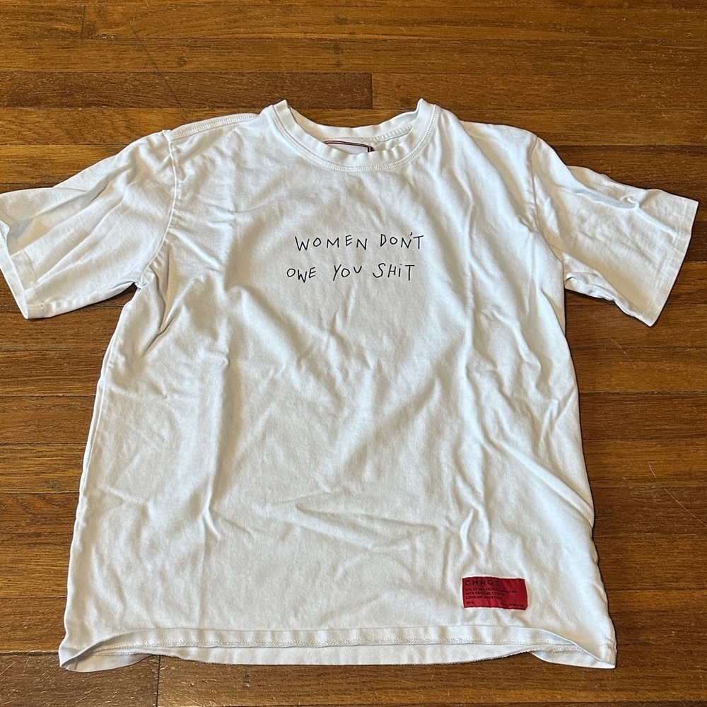 CHNGE White “Women Don’t Owe You Sh*t”Statement Tee, Unisex, Medium